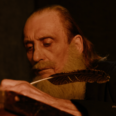John Wycliffe (Jared Morgan) writes a manuscript